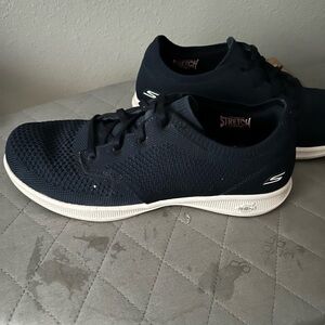 Sketchers navy blue slip on sneakers